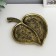Decorative polystone plate "Sheet with a flower pattern" under brass 4x12x15 cm
