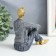 Souvenir Polystone "A young man in a gray sweater, sits" 14.5x7x14 cm
