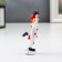 Polystone souvenir "Dancing clown with a cylinder" Red-white 8x3x4.5 cm