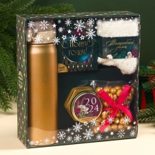 The set “Fun in the New Year”: Tea with taste tropical fruits 50 g, creamy with blueberry 120, socks of the rr: 36–39, thermos 500 ml.