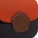 Richet bag on a magnet, a long belt, an orange/brown color