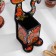 Standing for spoons "cat", Khokhloma