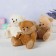 Soft toy "Bear", in a knitted scarf, mix color