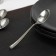 A single spoon is disposable, 12.5 cm, silver color