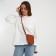 Bag Women's Cross-Bodi with a zipper, the color is red