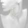 Ring earrings “Tenderness of pearls” are large, white color in gold, D = 8 cm