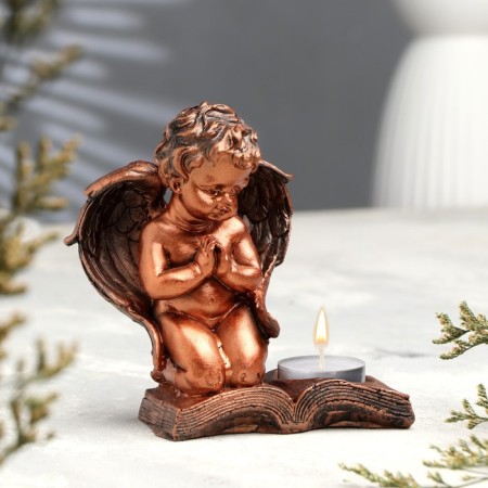 Summary "Angel", on a book, one candle, 12 x 5 x 13 cm