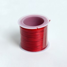 The cord waxed from polyester d = 0.5 mm, l = 50 m, red color