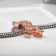Talisman "crocodile", color pink gold