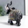 Polystone souvenir "Silver Elephant in Popon with patterns and rhinestones" MIX 15x14x7 cm