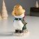 Polystone souvenir "Snowman with a cup on his head, feeds a bird at the Christmas tree" 9.5x6x11 cm