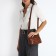 Cross-Bodi Bag on a zipper, brown color