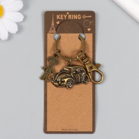 Trick Metal with carbine "Boy and car" Bronze 6 cm