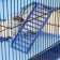 A cage for rodents with plastic shelves and filling, 36 x 23 x 34 cm, blue