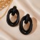 Earrings Metal "Botthega" two ovals, black color