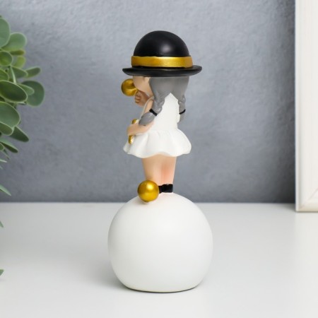 Polystone souvenir "Baby in a black hat, with a gold bubble on the ball" 15x7x7 cm-3
