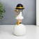 Polystone souvenir "Baby in a black hat, with a gold bubble on the ball" 15x7x7 cm