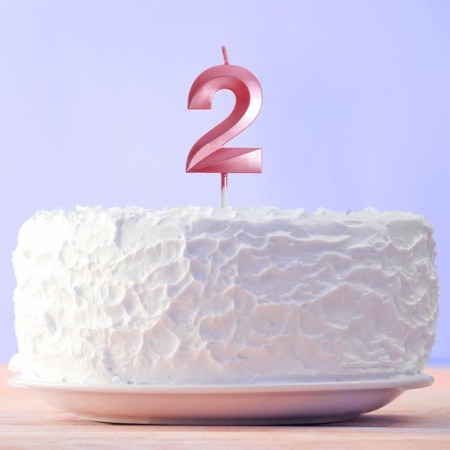 Candle for the cake, the number "2", pink.