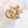 Brooch "Cat" with a fish, black color in gold