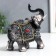 Polystone souvenir "Silver Elephant in Popon with patterns and rhinestones" MIX 15x14x7 cm