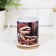 Putting mug of "Happiness in the New Year!" with application