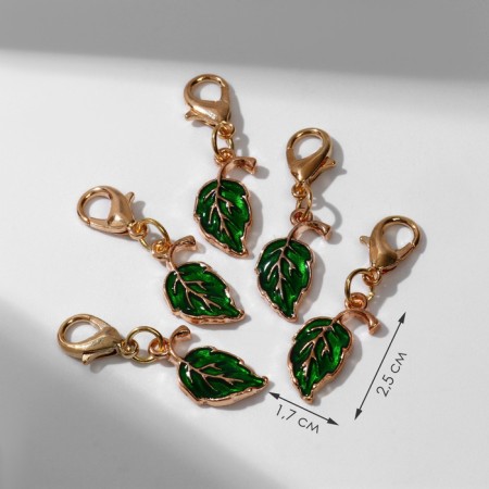 Charm "leaf", green color in gold