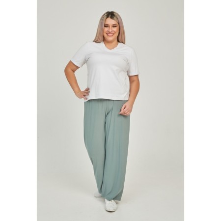 Female trousers, size 58, the color is light green