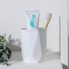 A glass for denture brushes 
