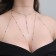 Erotic accessory on the body with rhinestones