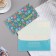 Envenue for money "Gift!" Blue background, gifts, 9x17 cm