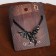 Unisex “Legends” pendant wing, black silver color on a black lace, 60 cm