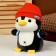Soft toy "Penguin" with a backpack, in a red hat, 22 cm