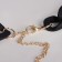 The necklace "chain" is flat links, black color, 48cm
