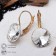 Earrings with rhinestones "Bright classic", white color in gold, d = 1.4 cm