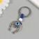 Keychain from the evil eye Metal "horseshoe" 3x6.5 cm