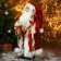 Santa Claus "in a red suit, with a patterned staff and a flashlight" 27x50 cm