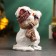 Snowman Snowman with a gift 12cm
