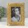 Photo frame Polystone 10x15 cm "Lesse spiral" gold 22x17 cm