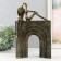Polystone souvenir "Two on the arch" under metal 19.2x8.7x30.4 cm
