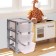 The chest of drawers is 3-section, transparent boxes, color gray color