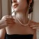The necklace "chain" with beads, white color in gold, l = 45cm