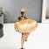 Souvenir Polystone stand "African with a dish, in a gold outfit" 31.5x10.5x12.5 cm