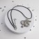 Piece on the cord "Snake", color black silver on a black lace, 42 cm