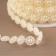 Pearls on threads, flat, 10 mm, 9 ± 1 m, milk color