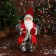 Santa Claus "in a long fur coat, with a flashlight" 28 cm, red
