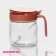 Glass sugar tower with a spoonful of the Coral shares, 8 × 11.5 cm