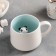 Ceramic mug with a figure at the bottom of "Hide and Humanitarianism. Panda ", 350 ml, white color