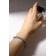 Bracelet with rhinestones "shine" on a puff, white color in silver