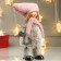 Interior doll "Girl in a pink hat with ears and white fur coat" 27x10x17 cm