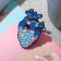 The icon "Heart" wounded, colored in ferrous metal